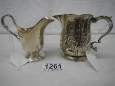 2 hall marked silver jugs, 233 grams.