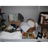 A small vintage case of miscellaneous items including gloves, perfume bottles,
