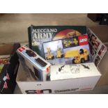 A box of Lego and Meccano.