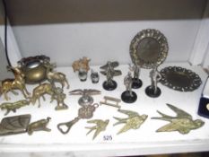 A mixed lot of brass items, pewter figures of Laurel & Hardy, Buster Keaton etc.