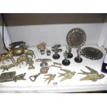 A mixed lot of brass items, pewter figures of Laurel & Hardy, Buster Keaton etc.