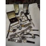 A mixed lot of vintage and other wrist watches.