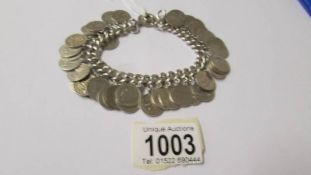 A silver three penny bit bracelet, 96 grams.