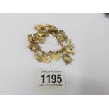 A 9ct gold charm bracelet, 34 grams.