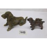 A 1920's spelter ashtray in the form of a spaniel and a dog lighter.