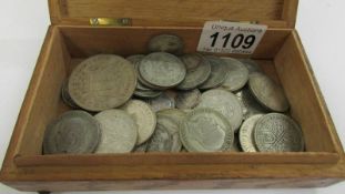 An oak box containing 417 grams of UK pre 1947 - 1920 silver coins.