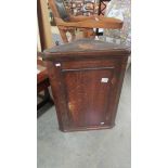 A small oak corner cupboard. (collect only).