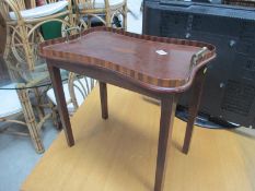 An inlaid framed table,