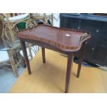 An inlaid framed table,