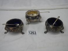 3 good silver salts complete with liners and spoons.