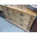 An oak 19th century chest of 4 drawers