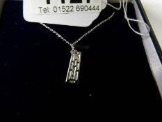 An 18ct white gold pendant necklace of 40 points.