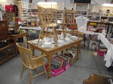 A solid pine kitchen table with 6 chairs, (collect only).