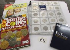 A collection of 50p and £2 coins (50p's face value £26.50 and £2 face value £60).