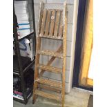 A wooden step ladder.