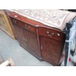 A mahogany sideboard