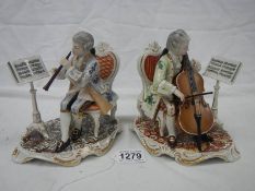 An excellent pair of Dresden mid 20th century figures of musicians, 7 cm tall.