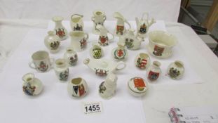 23 pieces of crested china.