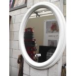 An oval mirror (collect only).
