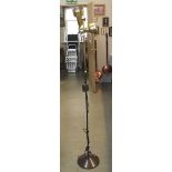 A metal floor standing lamp with brushed brass effect shades, (collect only).