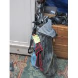 Two golf bags and clubs