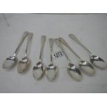 7 hall marked Georgian silver spoons, 225 grams.