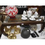 An oriental carved top table with glass inset top (collect only).