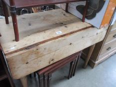 An old pine drop side kitchen table