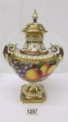A Royal Worcester two handled lidded vase painted with fruit by R Price.