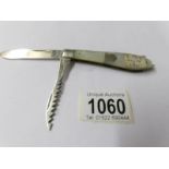 A silver and mother of pearl twin bladed pocket knife/saw, Sheffield 1914.