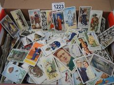 A box of approximately 2,000 cigarette cards including Wills, Gallagher, Players. Carrerras etc.