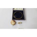 A 9ct gold bracelet together with a cameo brooch and earrings set in 9ct gold.