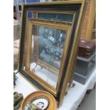 A fire screen and picture frames