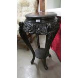 An antique carved Chinese pot/lamp stand. (collect only).