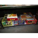 A quantity of old children's toys including Fisher Price music box record player.