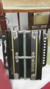 A boxed vintage Band Master squeeze box/accordion.
