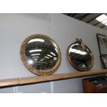 2 vintage mirrors, one oval and one round.