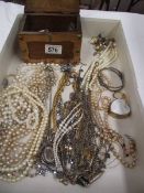 A mixed lot of costume jewellery and a small casket.