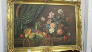 A gilt framed still life on canvas signed Van Bruyn.