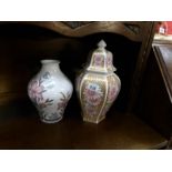 A German floral vase and an Italian 'Decor' vase with lid.