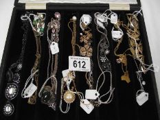 14 assorted pendants on chains.