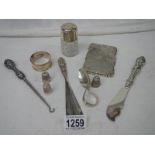 10 items of hall marked silver including card case (damage to hinge).