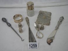 10 items of hall marked silver including card case (damage to hinge).