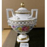 A fine Dresden porcelain two handled urn signed by the artist.