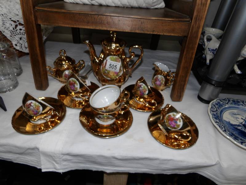 An 18 piece gilt J K W Karlsbad porcelain tea set.