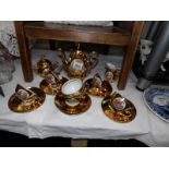 An 18 piece gilt J K W Karlsbad porcelain tea set.