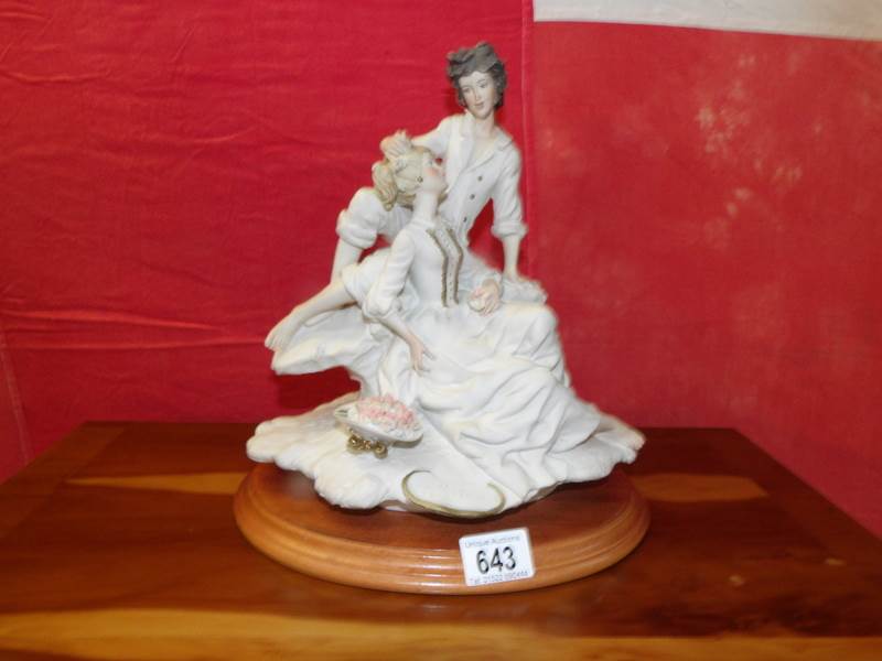 An Italian lovers figural group singed A Beliora.