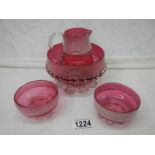 4 pieces of cranberry glass (foot a/f on jug).