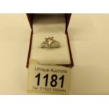 An 18ct half carat plus white gold diamond ring with diamond shank, size M.