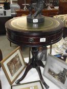 A dark wood stained drum side table with gilded green leather top. (collect only).